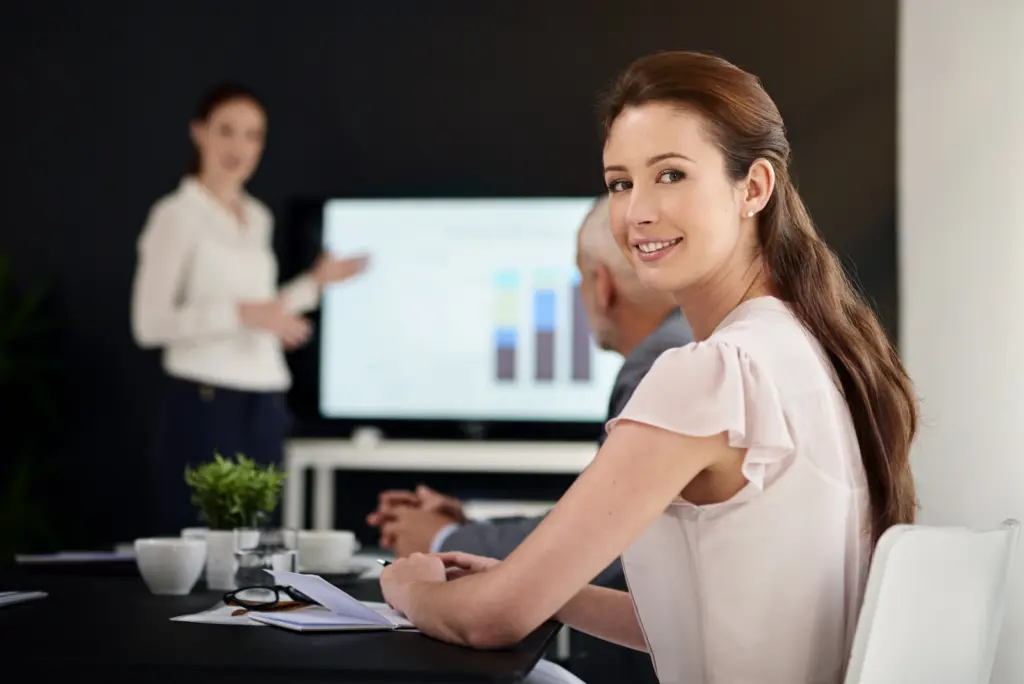 Woman sitting at a business meeting