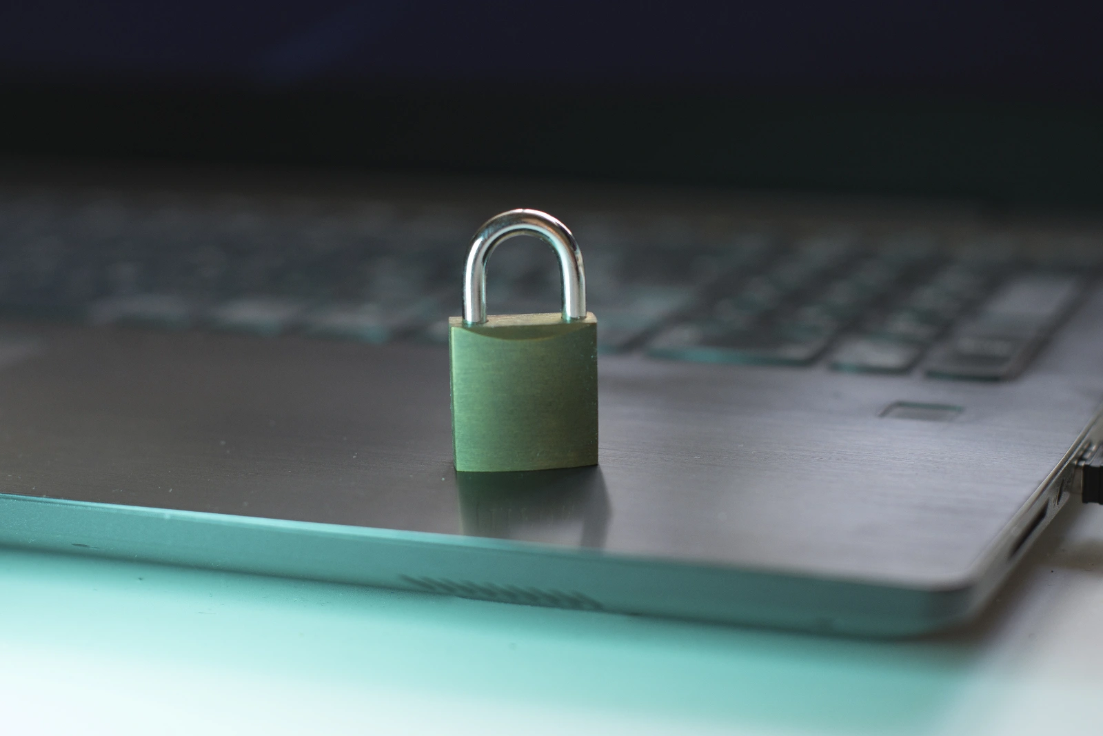 padlock resting on a laptop