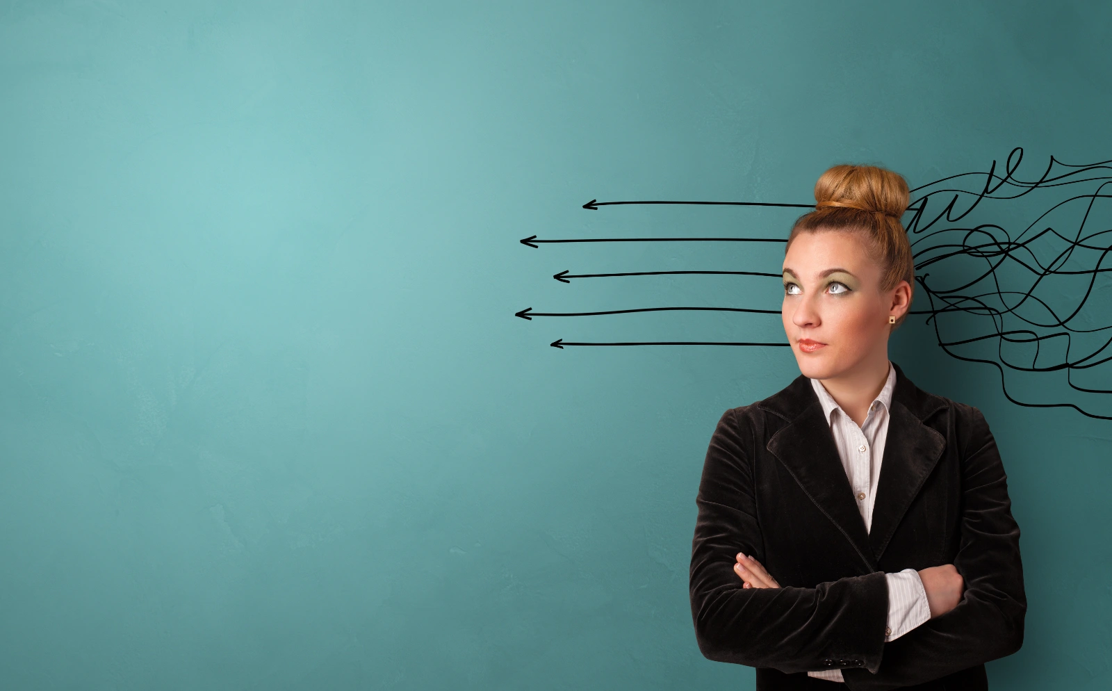 women standing in front of wall with arrow illustration